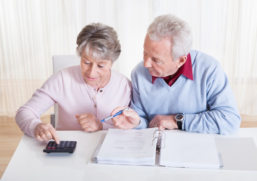 Senior Couple Calculating Budget