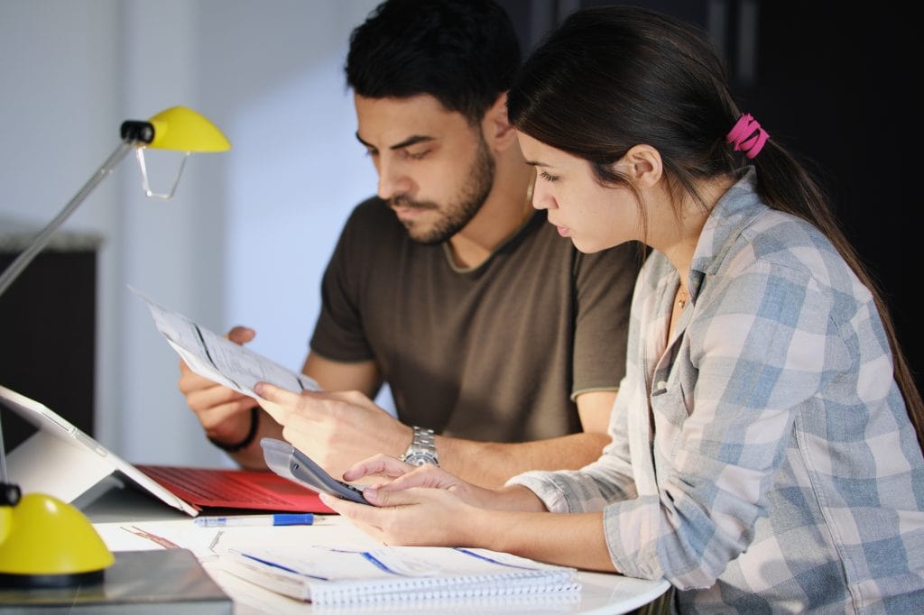 Man And Woman Doing Financial Budgeting