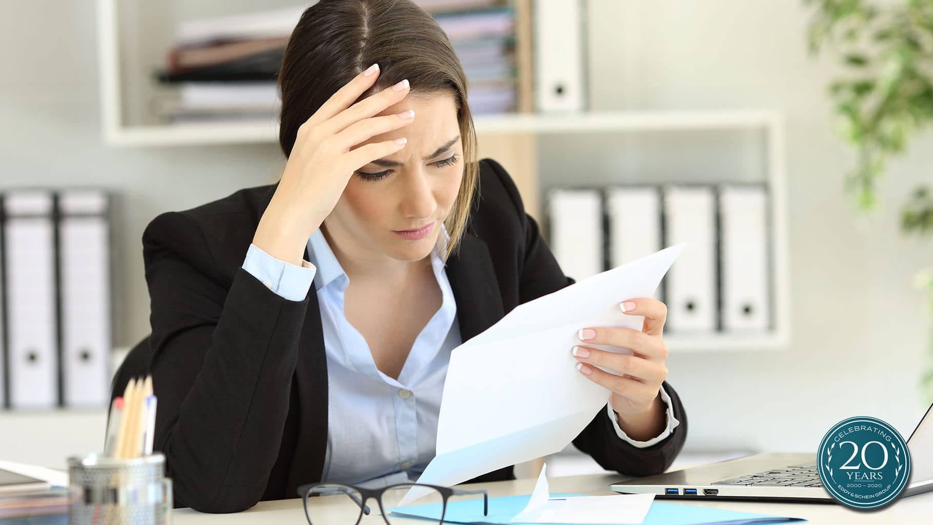 Woman confused when reading financial and tax documents